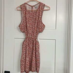 NWT. American Eagle side cut floral out romper